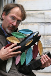 Doug the artist sculptor with feather fish