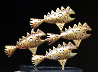 prehistoric spotted fish pen sculpture